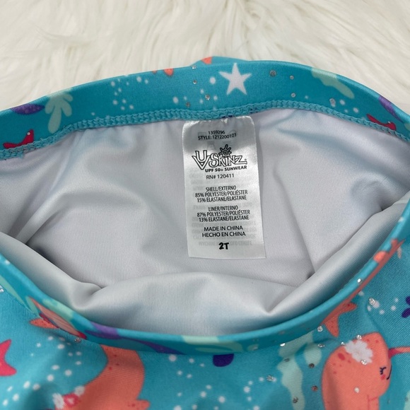 UV SKINS SUN WEAR TWO PIECE SWIM SUIT UPF 50 PURPLE WITH RUFFLE BOTTOMS SZ 2T - Picture 10 of 12